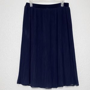 Pleated blue skirt.